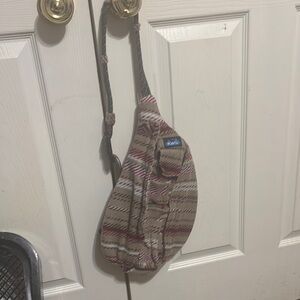 Kavu Sling Bag with Red and Tan Pattern